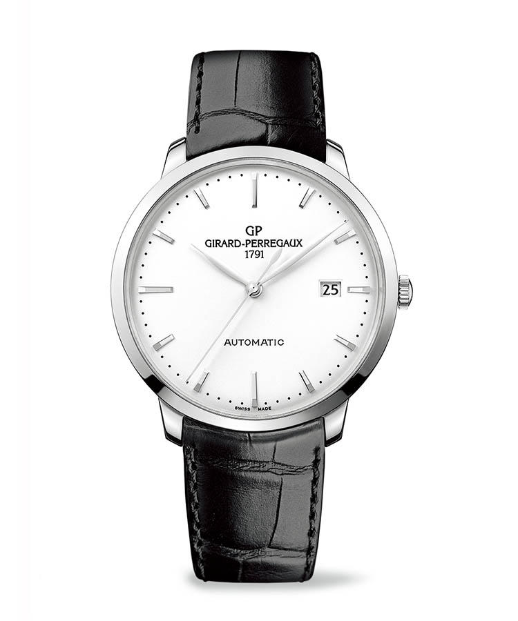 <b>GIRARD-PERREGAUX</b></br>ジラール・ペルゴ</br></br><b>1966 40mm</b><hr><b>名門のヘリテージを現代に伝える１本</b></br>ヌシャテル天文台100周年記念賞を獲得した、1966年製モデルにオマージュを捧げるコレクションからの１本。緩やかなドーム型のサファイアクリスタルやリーフ型針など、上質なヴィンテージ感と高精度とを現代に受け継ぐ。8.9mm厚の薄型仕立てが、ドレッシィ。細部の仕上げも名門らしく、上質である。自動巻き。径40mm。SSケース。アリゲーターストラップ。87万円（ソーウインド ジャパン）