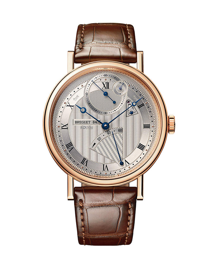 <b>BREGUET</b></br>ブレゲ</br></br><b>クラシック クロノメトリー 7727</b><hr><b>磁力を味方に高精度を得る、かつてない発明</b></br>従来の素材では磁力に影響される脱進機とヒゲゼンマイをシリコン製とし、テンプを強力な磁石で支えることを実現。磁力によって重力に抗い、2つのヒゲゼンマイの巻き方向を逆にして重ねることで、高精度を実現した。しかも毎秒20 振動のハイビート機。1時位置のインダイヤルの針が高速回転し、革新性を伝える。手巻き。径41mm。18KRGケース。アリゲーターストラップ。433 万円（ブレゲ ブティック銀座）