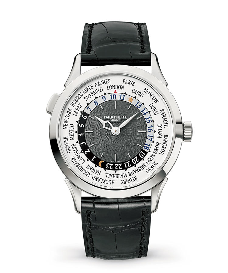 <b>PATEK PHILIPPE</b> パテック フィリップ</br><b>5230 ワールドタイム</b><hr style='margin-bottom:20px'><b>一層繊細な美観をまとった元祖ワールドタイマー</b></br>ワールドタイマーのスタンダードなスタイルを築き上げたのが、パテックフィリップだった。誕生は、1937年。これは2016年に発表された最新作だ。時針が示すタイムゾーンは、10時位置のボタンで操作。スケルトナイズした時針は見やすく、ダイヤル中央には複雑な籠目ギョーシェで彩られる。ケース厚は10.23mm。複雑機構を薄く仕立てる技術力に感服。自動巻き。径38.5mm。18KWGケース。アリゲーターストラップ。529万円(パテック フィリップ ジャパン・インフォメーションセンター)