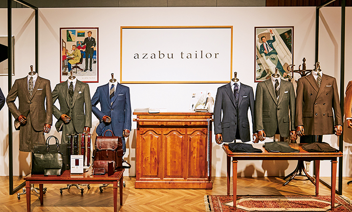 <p><strong>azabu tailor</strong><br />
ビジネスマンの信頼が厚いオーダースーツの人気店。同社提案の紳士のワードローブが並ぶ。</p>
