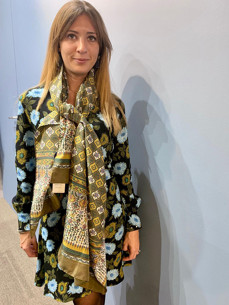 <p><strong>13.  Stefano Cau scarf / ステファノ・カウのスカーフ</strong><br />
I like garments with a story.  This lightweight scarf worn by Giorgia is made of habutai silk (literally translated to feather-two-layer)<br />
The pattern was inspired by the tile work on an Armenian church which Stefano and Giorgia visited  on a recent trip to Israel.  A gum finish was added to soften the fabric and mute the colors.</p>
<p><small>私は、ストーリーのある服が好きです。ジョージアが身につけている薄手のスカーフは、羽二重シルクからできています。この柄は、ステファノとジョージアがイスラエル旅行で最近訪れたアルメニアン教会のタイルからヒントを得ています。生地を柔かくし、色調を抑えるための加工が施されています。</small></p>
